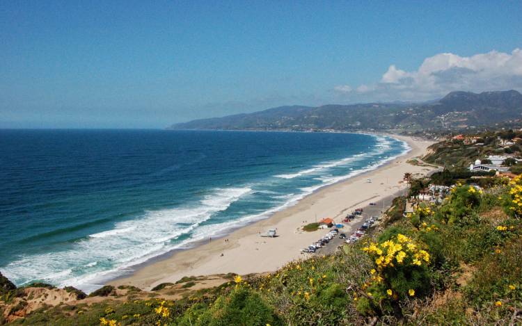 ZUMA BEACH, CALIFORNIA, USA - Lifeguard watching swimmers on Zuma